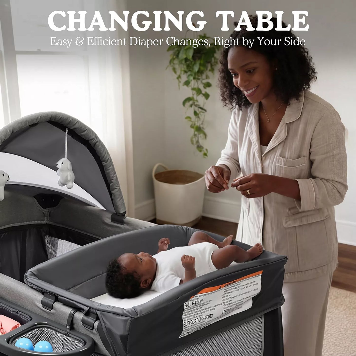 4-in-1 Portable Baby Playard with Bassinet, Changing Table and Canopy